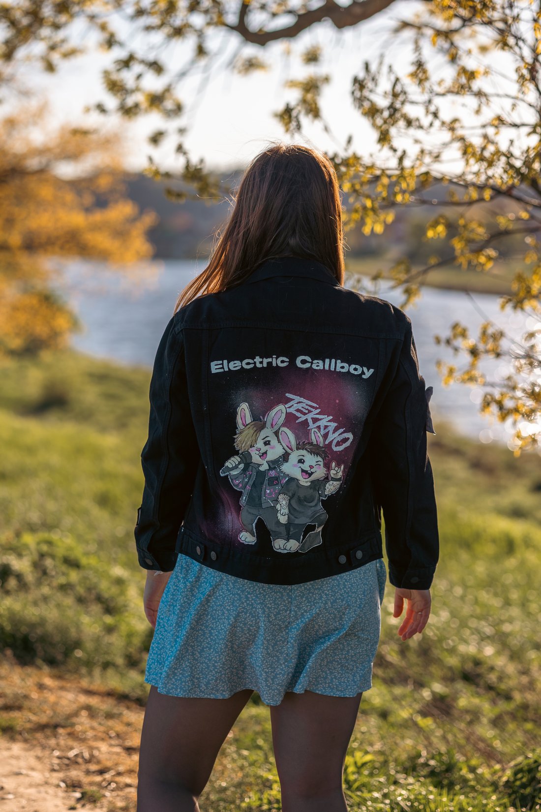 Hand-painted denim jacket, Electric Callboy Tekkno design, worn outdoors